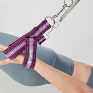 Small Y loop straps in use on Pilates Cadillac, purple rainbow