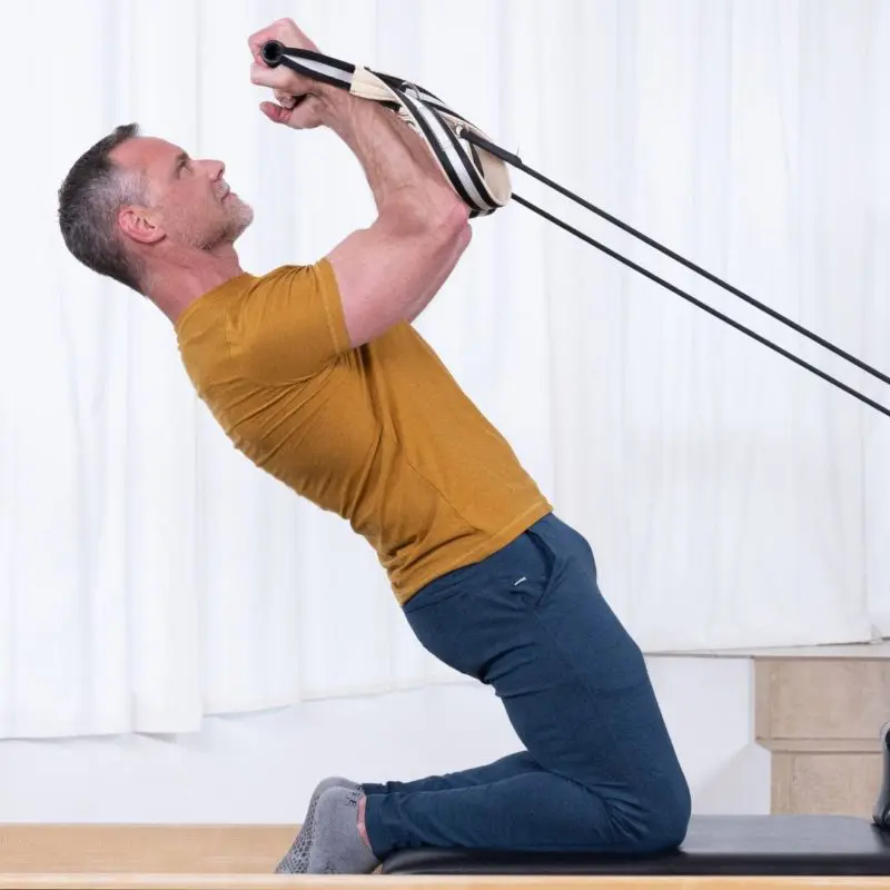 Sean Bergara combining ELEMENTS Straps and Roll Handles for upper body conditioning