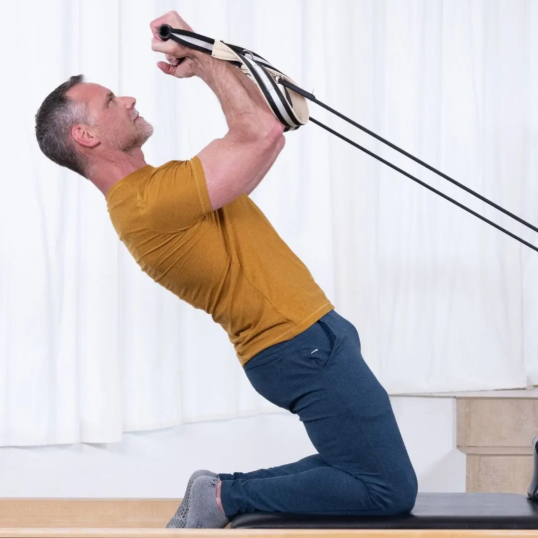 Sean Bergara combining ELEMENTS Straps and Roll Handles for upper body conditioning