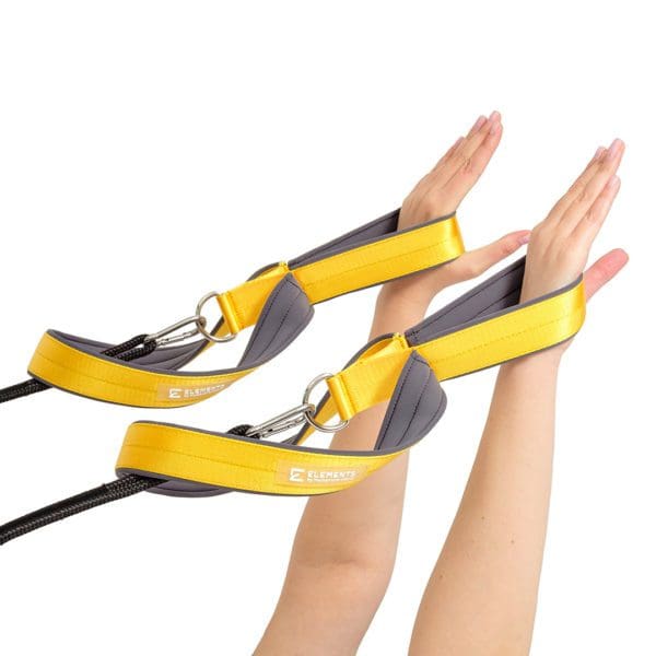 ELEMENTS Pilates Reformer Double Loop Straps in use, yellow and grey