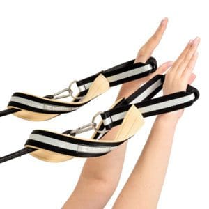 ELEMENTS Pilates Loop and Roll Straps in use, black and white with beige neoprene lining